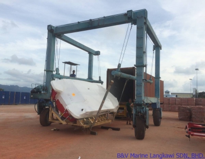 Unloading the powerboat off the container #3