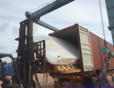 Unloading the powerboat off the container #2